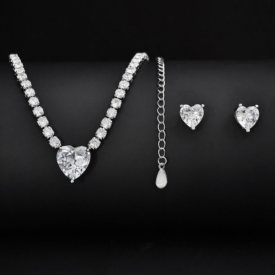 Elegant two-piece jewelry set featuring a gold necklace and matching earrings, perfect for weddings and special occasions

