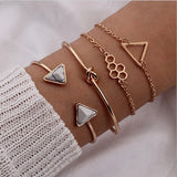 Gold honeycomb bracelet
Fashionable wrist accessories
Chic layered bracelets